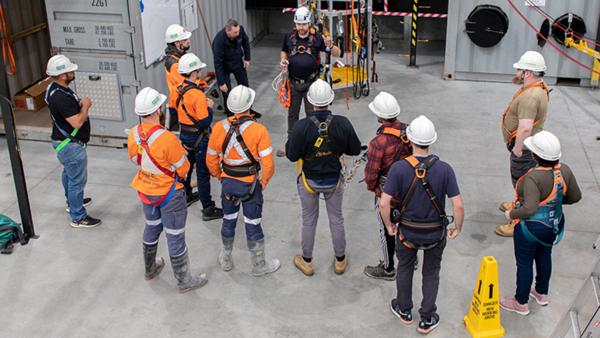 Trainer and participants preparing to undertake work at heights exercises.