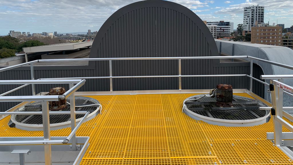 Cooling tower platform and guard rail on top of a hospital in Sydney.