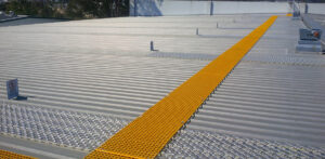 FRP walkway installed on a metal roof.