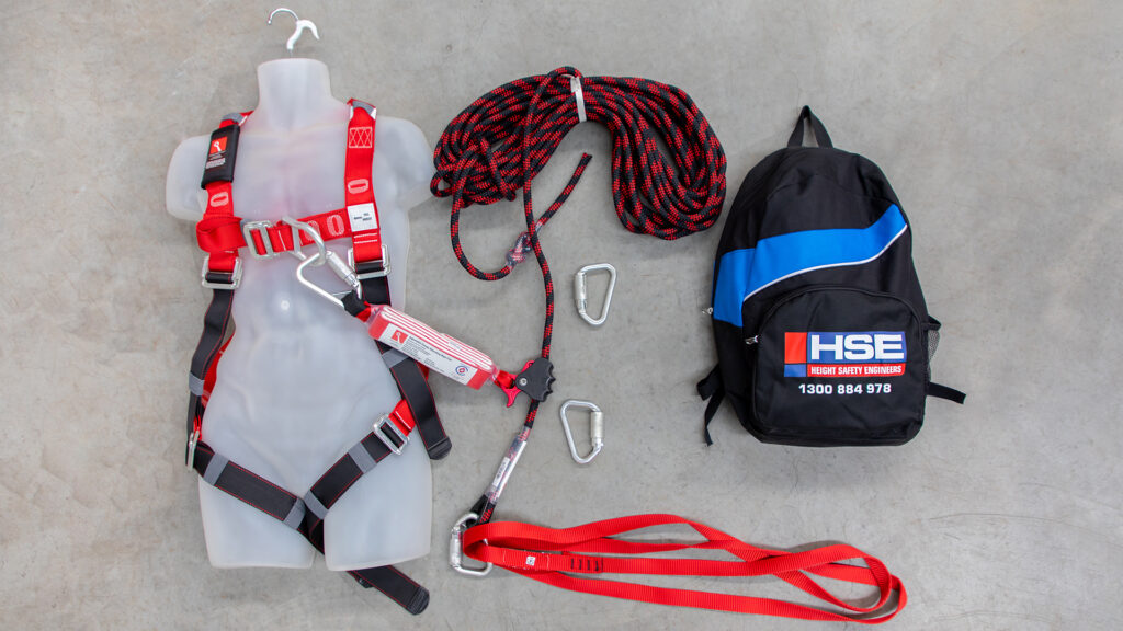 HSE roofers' kit includes a harness, rope line, shock absorber, line adjuster, anchor strap and additional karabiners as well as a carry bag.