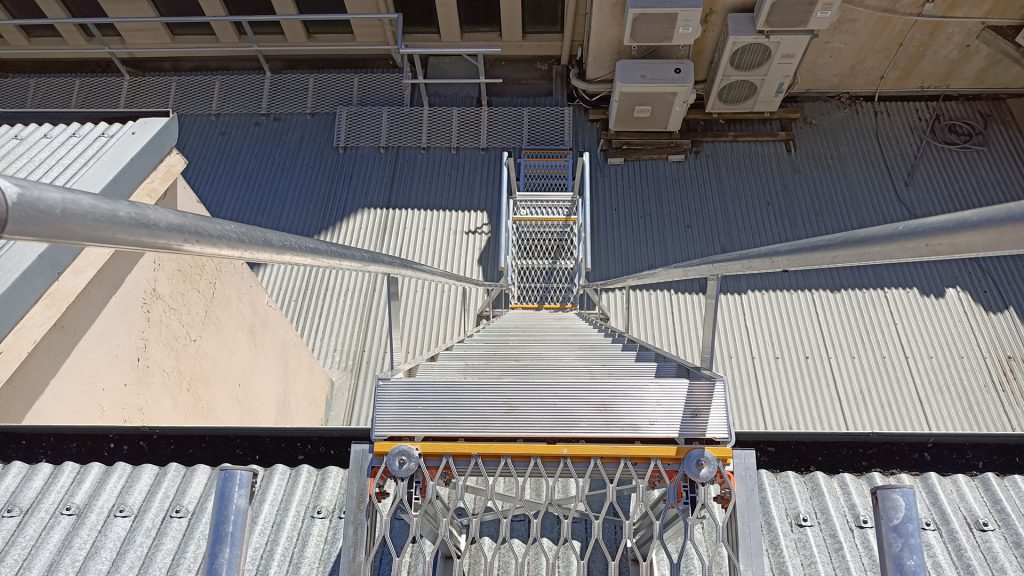 Metal step-type ladder and landing platforms on the Royal Exhibition Building, Melbourne. Installed by HSE Melbourne technicians.