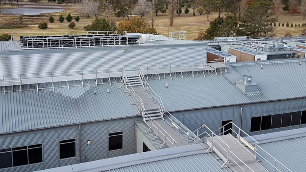 Roof top walkways and stairs for solar panel and plant access.