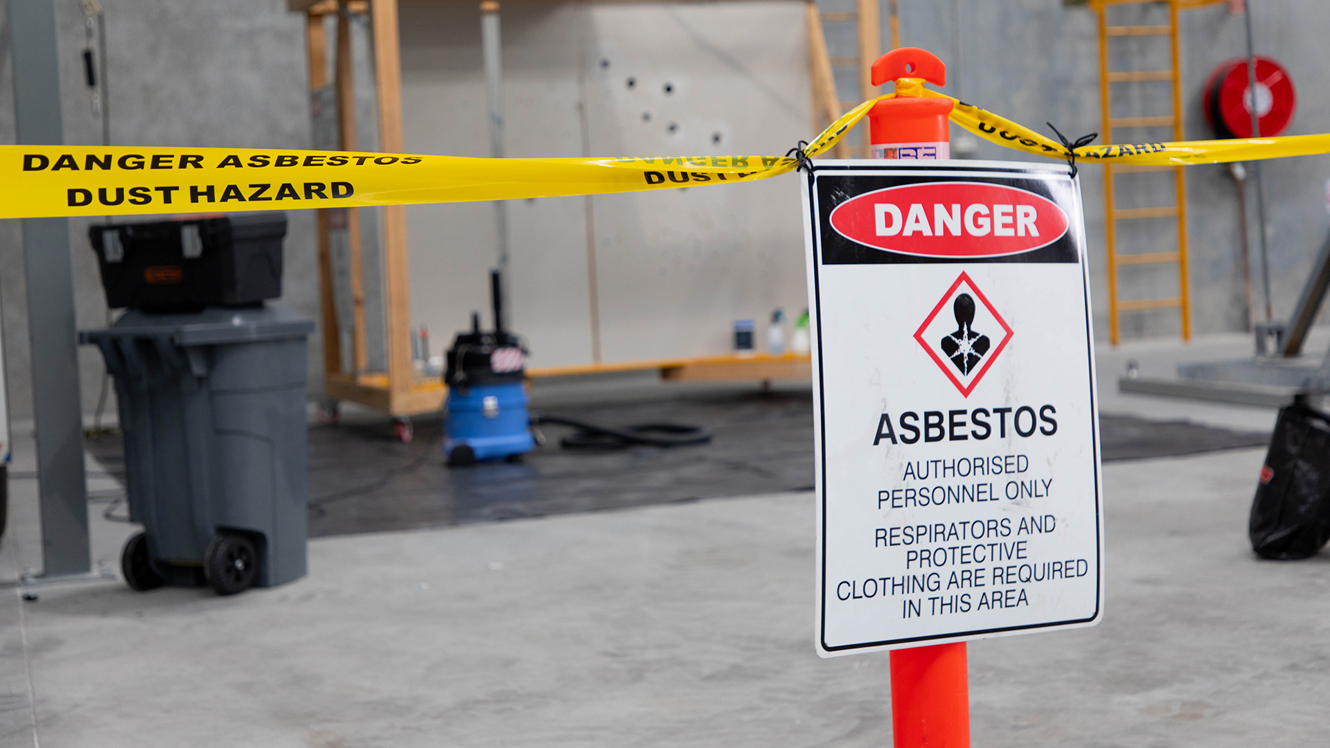 Asbestos danger sign in the HSE Sydney training area.