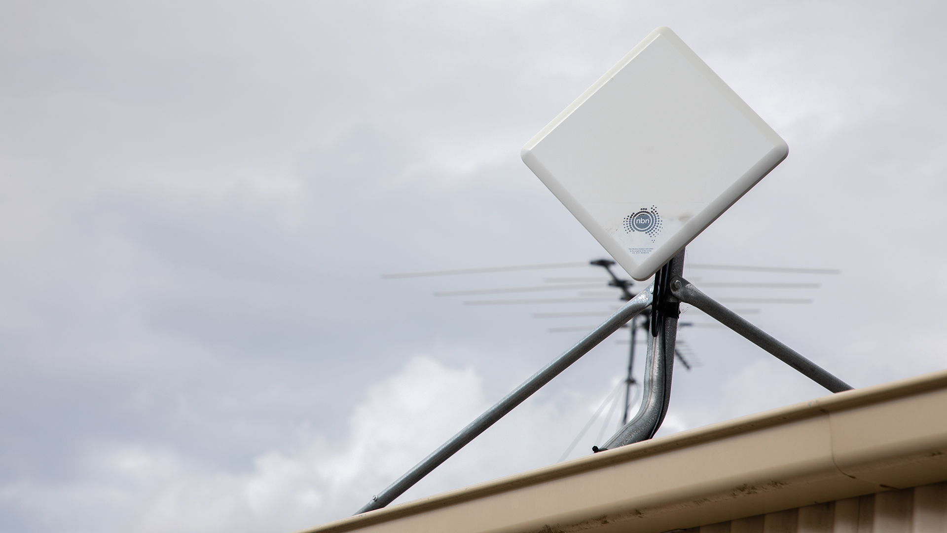 NBN fixed wireless internet equipment installed on a residential roof.