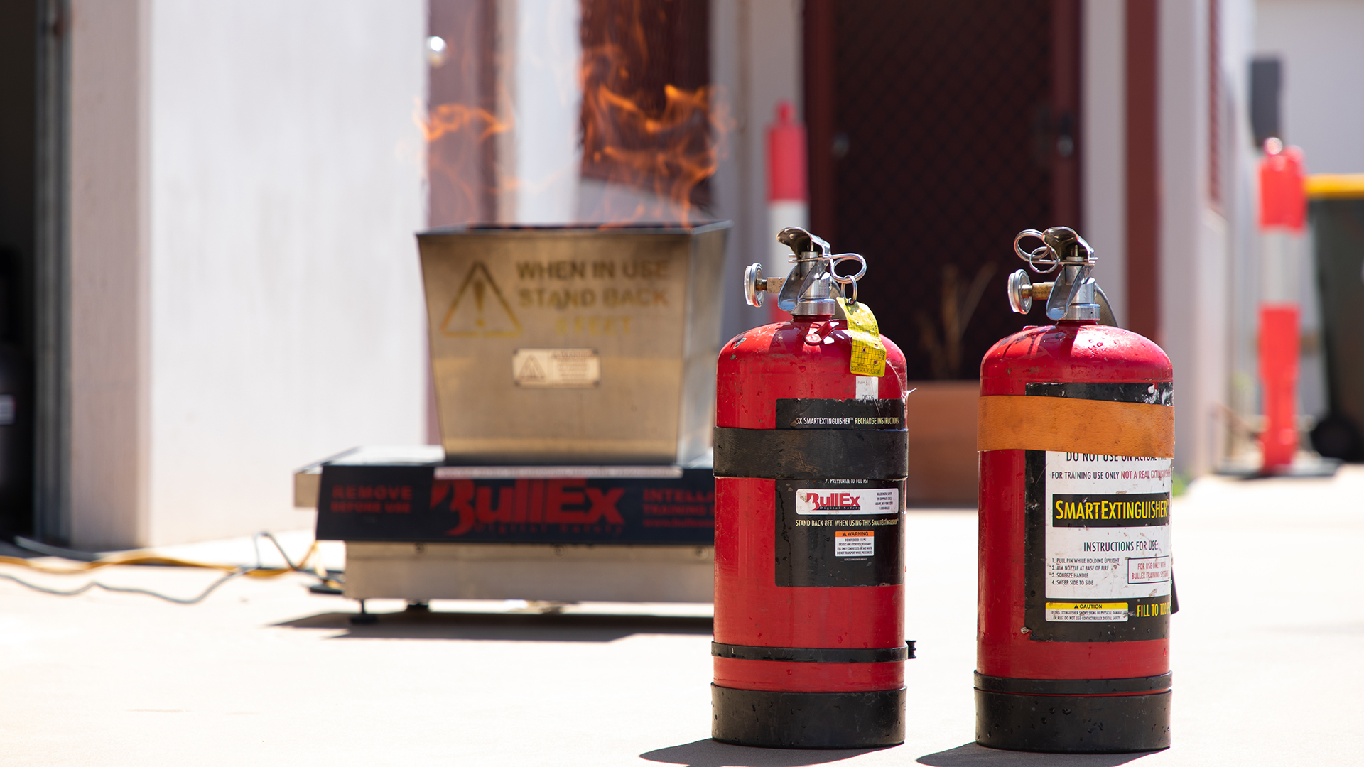 Practice fire extinguisher setup.